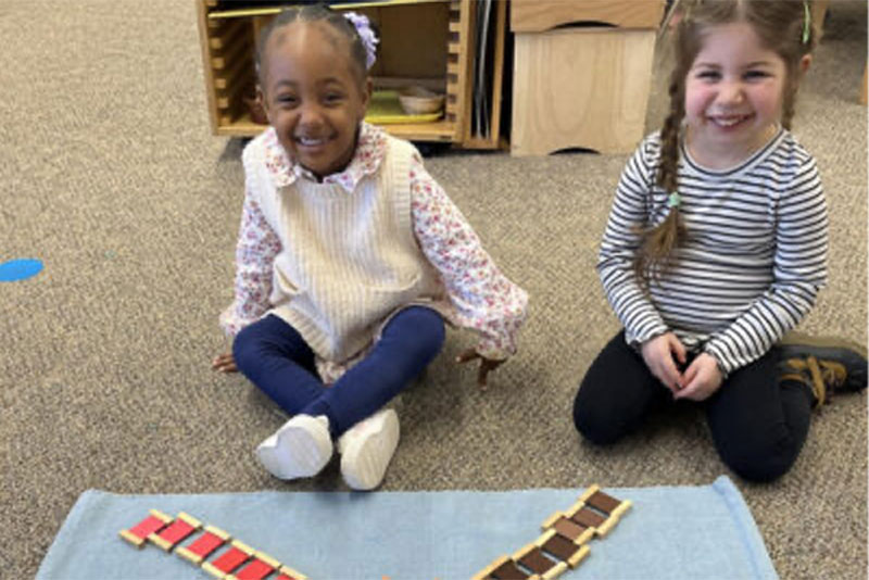 row-1-girls Girls in a Montessori classroom