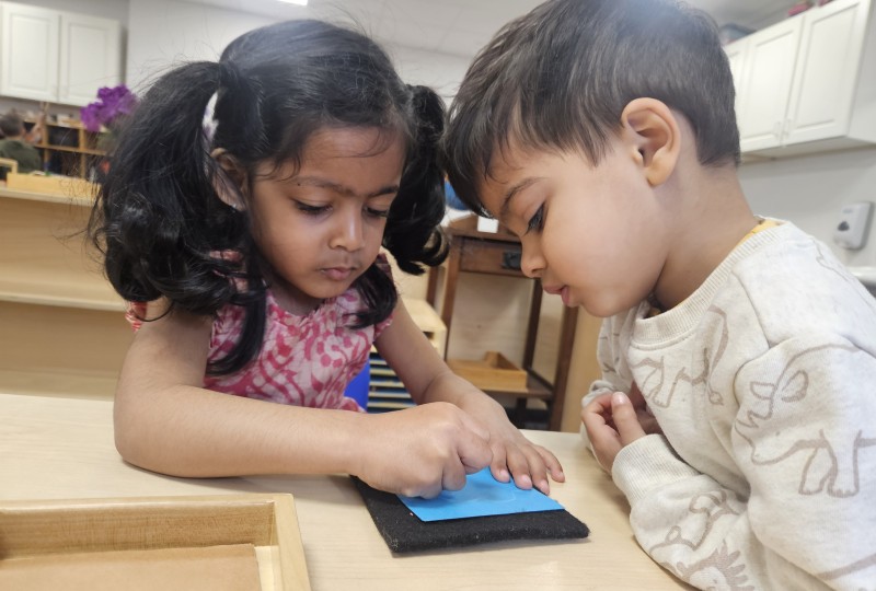 boy and girl Kids in a Montessori classroom